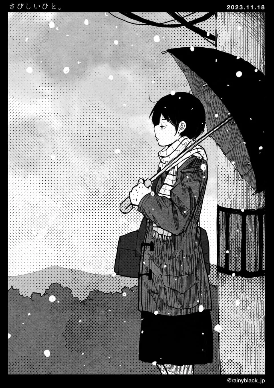 傘をさし雪の中で佇む女性